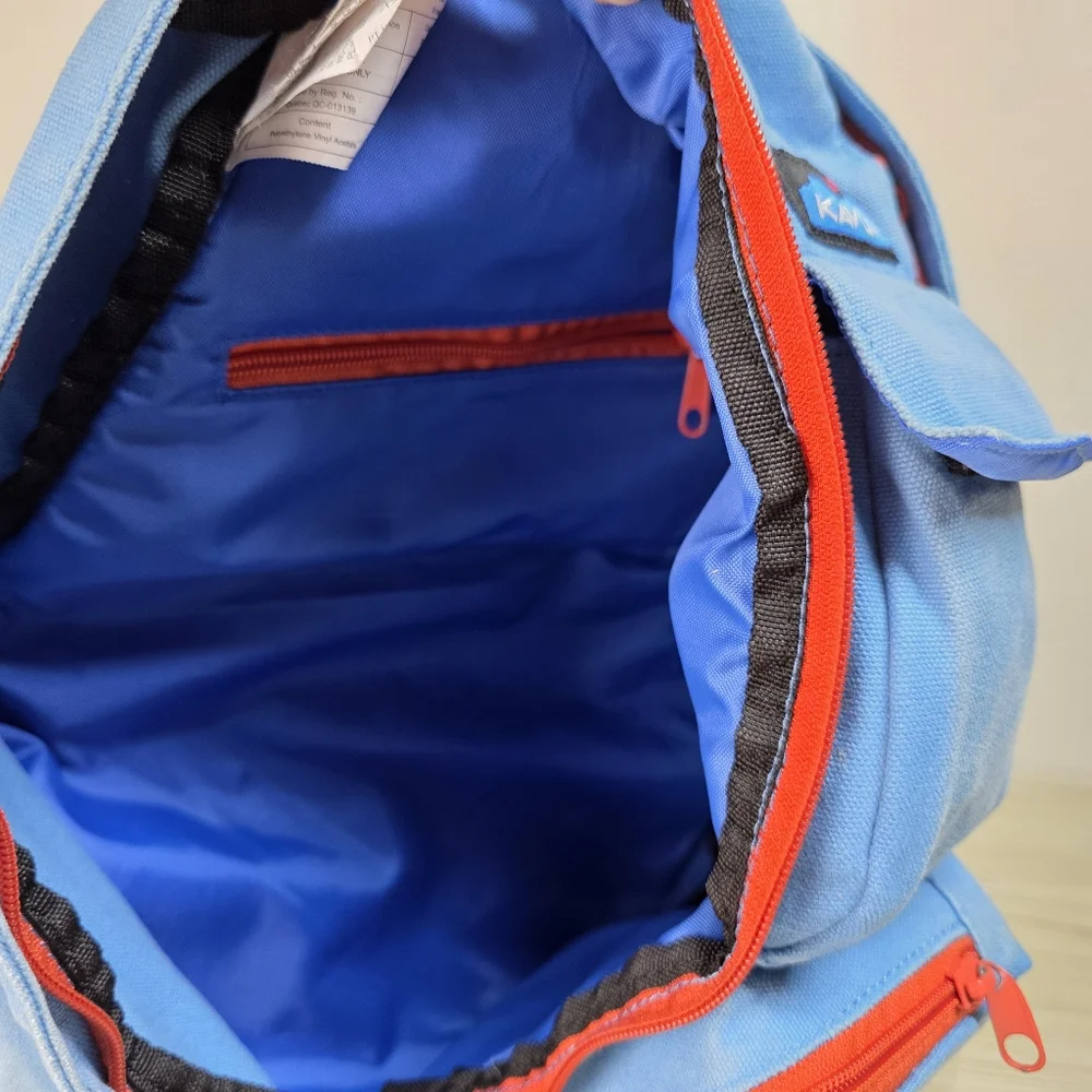 KAVU Denim Blue Sling Backpack with Orange Accents, Adjustable Rope Strap